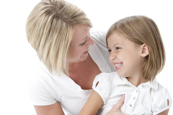 Image of a caucasian mother and daughter tickling and laughing — Stock Photo, Image