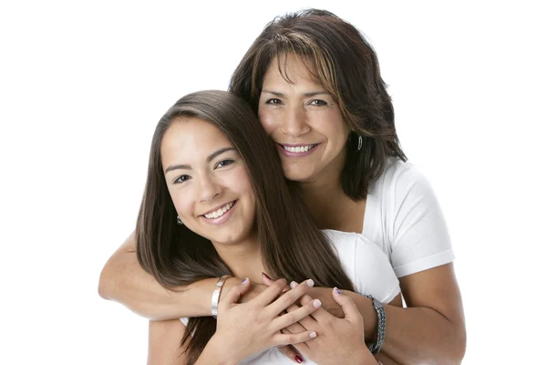 Closeup image of smiling hispanic mother and teenage daughter — Stock Photo, Image