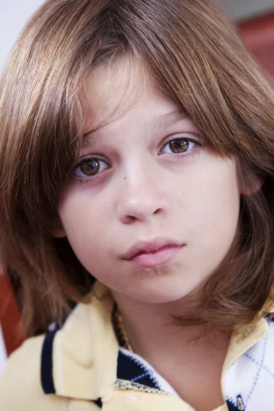 Close up headshot of serious little boy — Stock Photo, Image