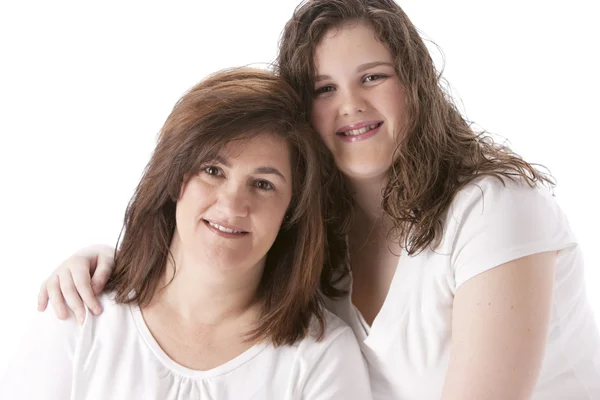 Imagem de mãe branca sorridente com sua filha adolescente — Fotografia de Stock