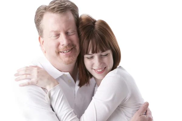 Father hugging his teenage daughter — Stok fotoğraf