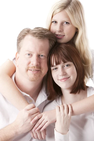 Primer retrato de padre y dos hijas adolescentes — Foto de Stock