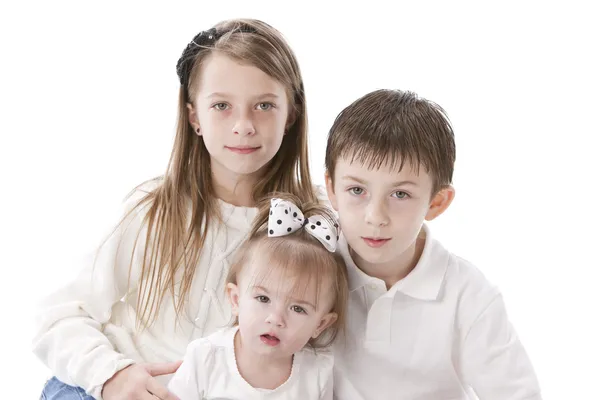 Image of caucasian siblings with fraternal twins — Stock Photo, Image