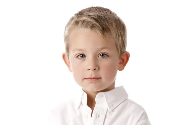 Niño caucásico con una leve sonrisa —  Fotos de Stock