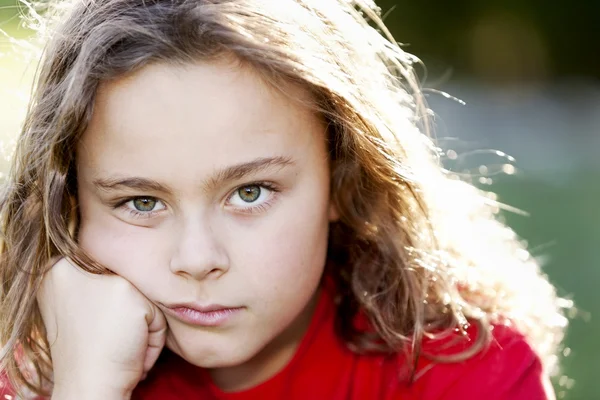 Headshot of mixed race boy outside in the sunshine — Stock Photo, Image