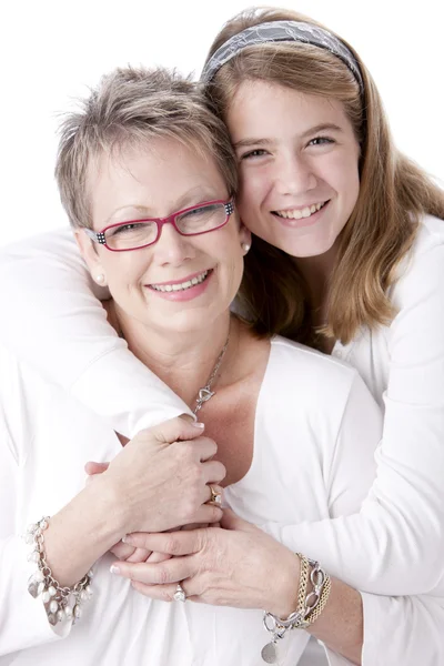 Image of a caucasian daughter hugging her mother — Stock Photo, Image