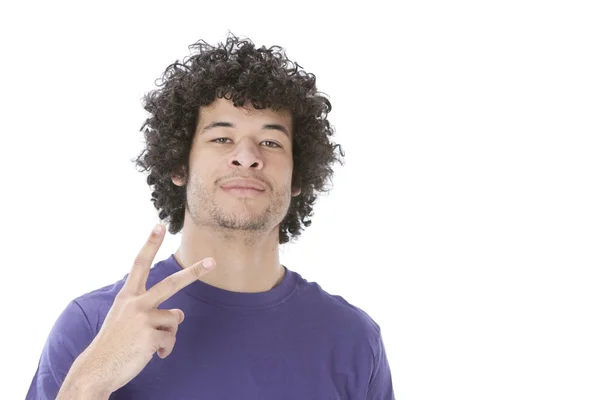 Mixed race young man making a peace sign or the number 2 with his fingers — Stock Photo, Image