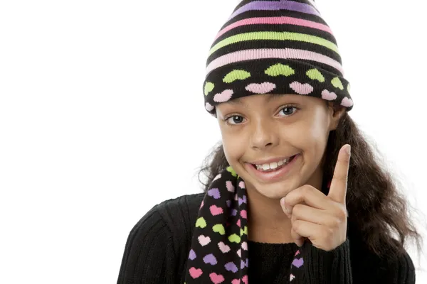 Preteen african american girl has her finger up as if she is pointing or has an idea — Stock Photo, Image