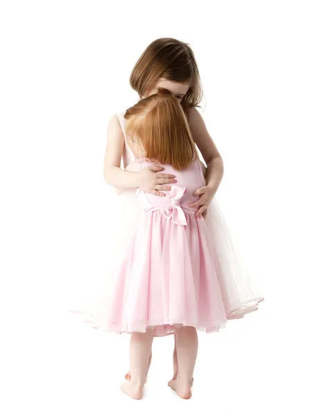 Full length image of two sisters hugging each other — Stock Photo, Image