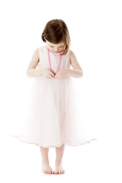 Full length image of little girl in a feminine pink dress — Stock Photo, Image