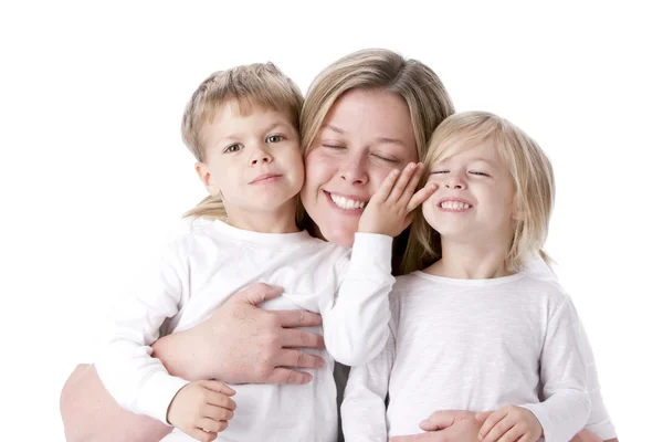 Riendo madre caucásica y sus hijos Fotos de stock