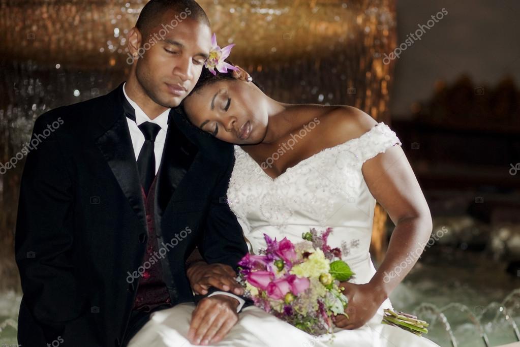 https://st.depositphotos.com/1987283/2136/i/950/depositphotos_21360439-stock-photo-bride-and-groom-posing-by.jpg
