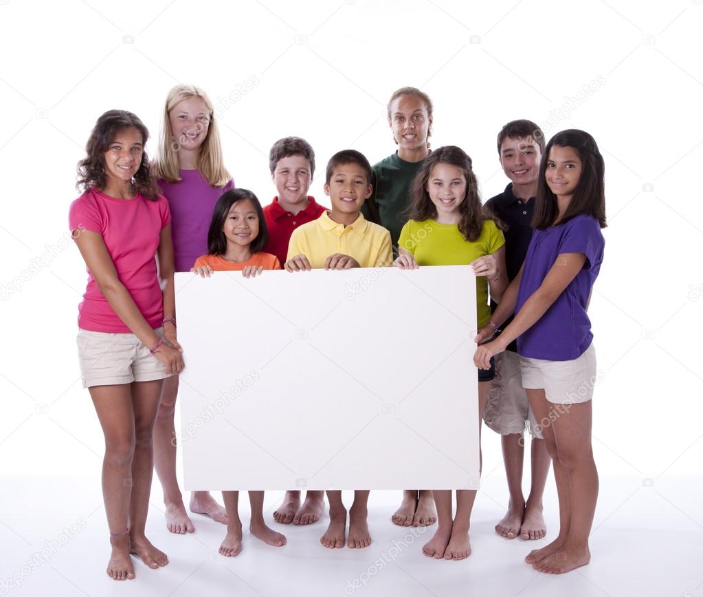 Cute children and teens holding blank sign