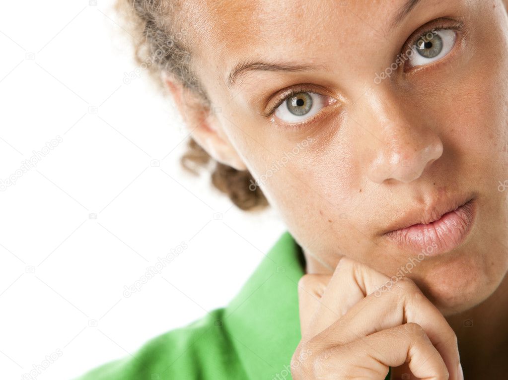 Mixed race teenage girl with thoughtful expression