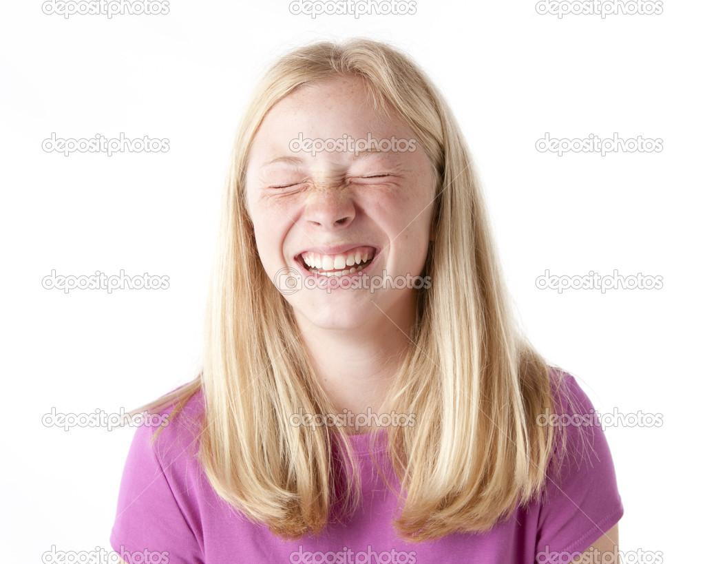 Laughing caucasian preteen girl