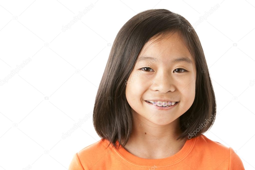 Asian cute girl with big smile and braces