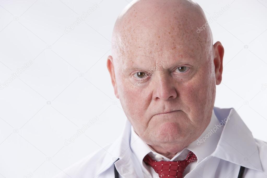 Headshot of serious doctor