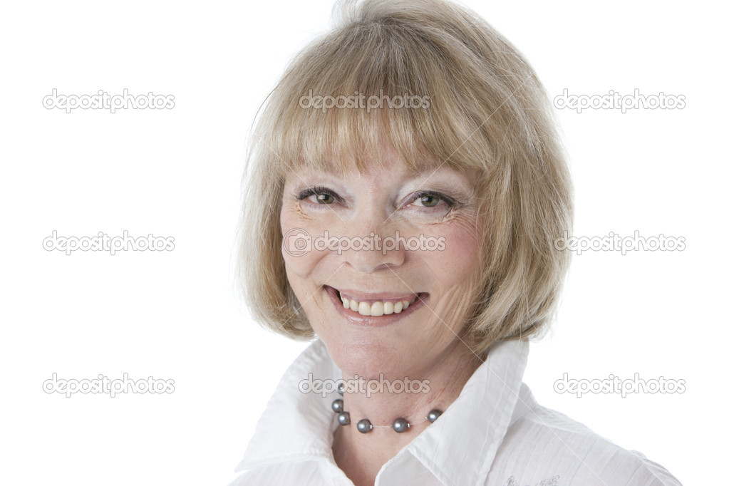 Headshot of smiling caucasian senior woman with a confident face