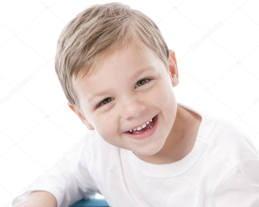 Laughing caucasian little boy with brown hair