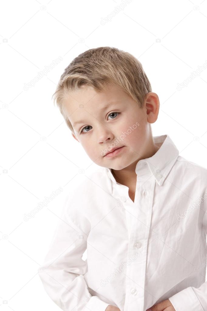Little boy with a pensive or unsure expression on his face