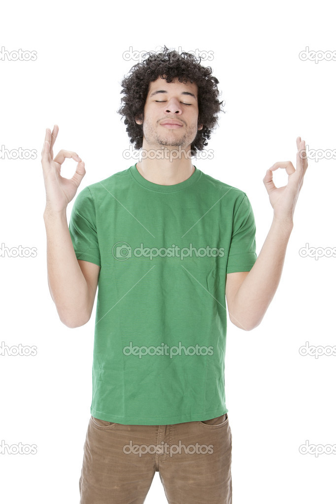 Waist up image of mixed race young man meditating