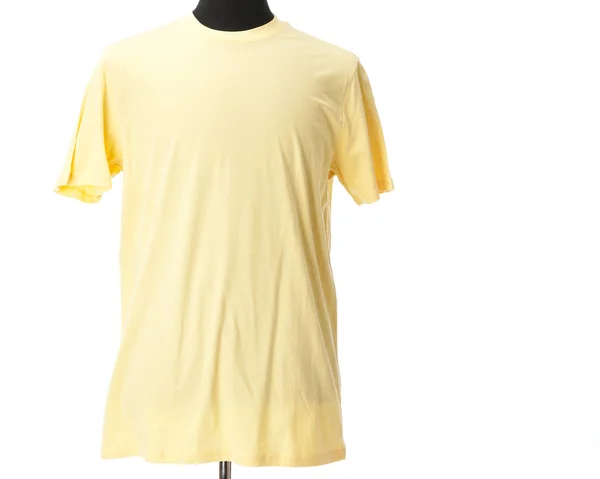 Бледно-желтая футболка на манекене — стоковое фото