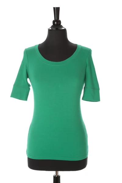 A bright green t-shirt for women or girls on a mannequin — Stock Photo, Image