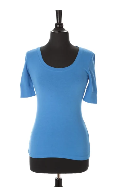 Una camiseta azul turquesa brillante para mujeres o niñas en un maniquí —  Fotos de Stock