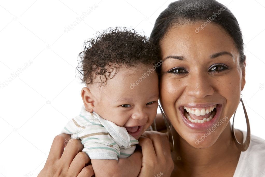 Real. Laughing black mother with her one month old baby boy