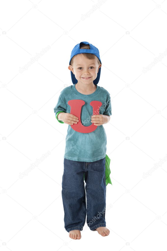 Human Alphabet. Caucasion little boy holds Letter U