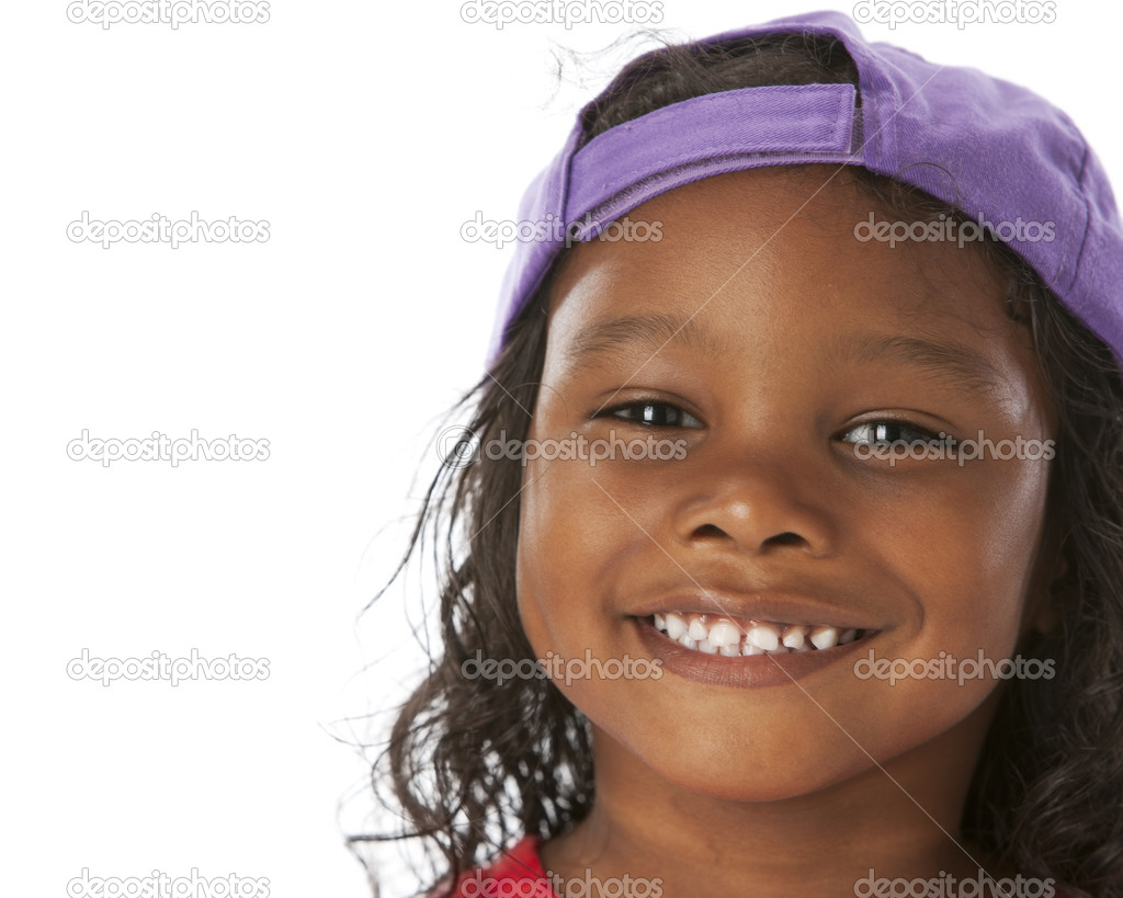 Real. Closeup mixed race little boy wearing a bright purple baseball cap