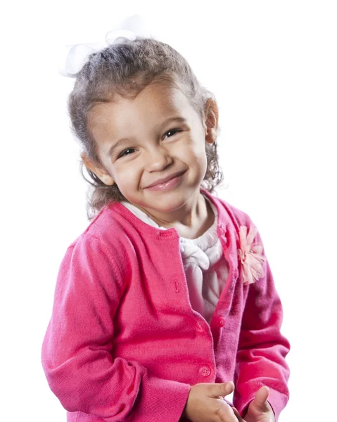 Sonriente niña de raza mixta en rosa . — Foto de Stock