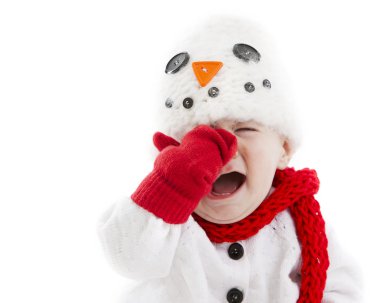 Little baby dressed up as snowman cries and throws a temper tantrum