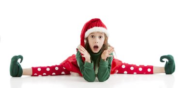 çok esnek bir küçük kız Noel elf bölmelerini yapar