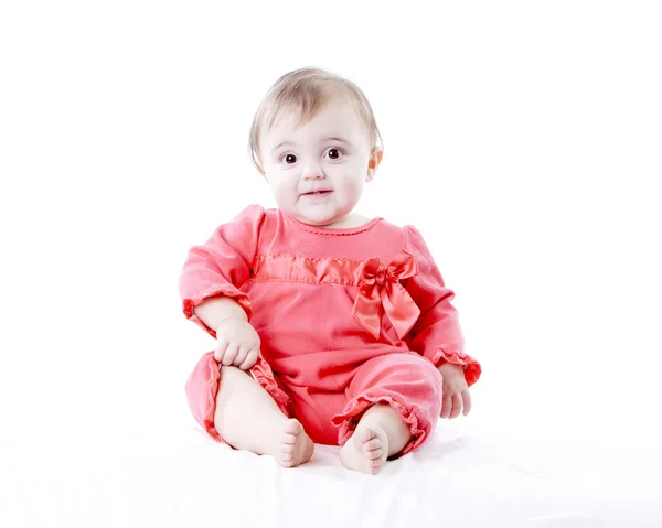 Glimlachend? aucasian babymeisje met een grote glimlach op haar gezicht — Stockfoto
