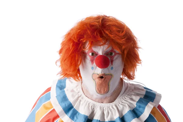 Clowner. vuxna manliga clown med en blick av överraskning på hans ansikte — Stockfoto