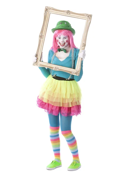 Clowns. junge Teenie-Clownin hält einen Bilderrahmen um ihr Gesicht — Stockfoto