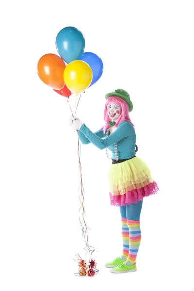 Klaunów. młody nastolatek pajac kobiece trzymający pęk balonów helem kolorowe — Zdjęcie stockowe