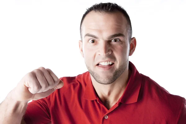 Caucasian young adult male with an angry expression — Stock Photo, Image