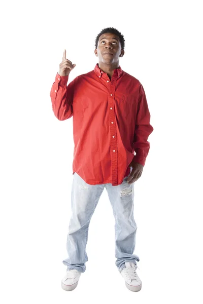 Young man pointing and looking up — Stock Photo, Image