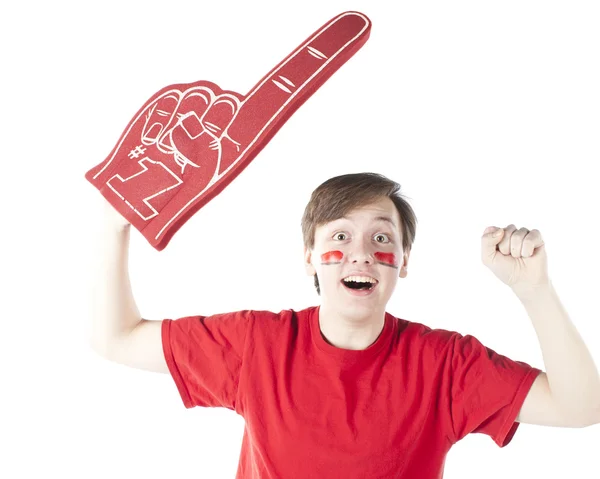 Sports Fans. Caucasion male sports fan roots for the red team with foam finger and face paint — Stock Photo, Image