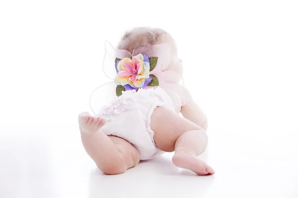 Closeup of a 7 month old caucasian baby girl crawling — Stock Photo, Image