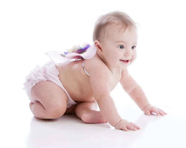 Closeup of a 7 month old caucasian baby girl crawling — Stock Photo, Image