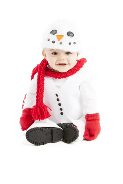 En liten baby klädd som en snögubbe — Stockfoto