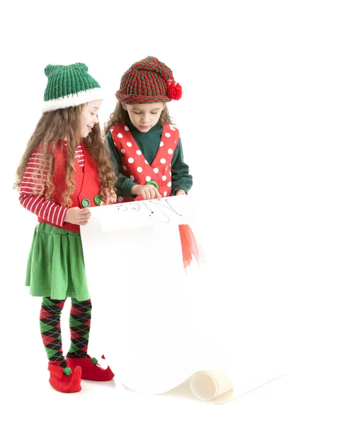 Los elfos de Santas sostienen una señal en blanco para el mensaje de Navidad —  Fotos de Stock