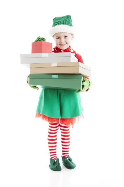 Santas helper elf carries tall Stack of christmas presents — Stock Photo, Image