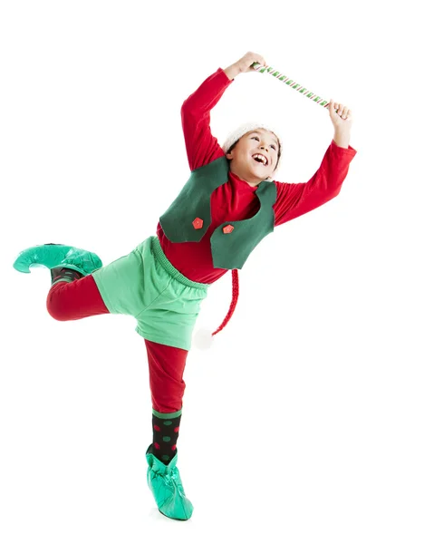 Einer der Weihnachtselfen tanzt mit Freude. — Stockfoto