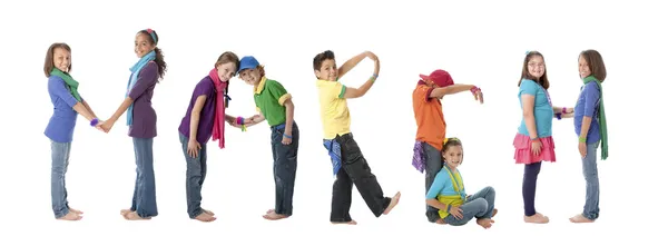 Multicultural children work together to form letters of the alphabet — Stock Photo, Image