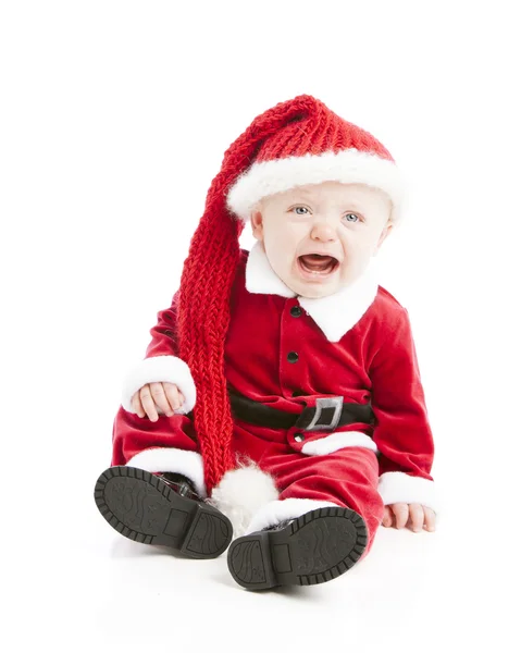 Piangere bambino bambino vestito come Babbo Natale Fotografia Stock