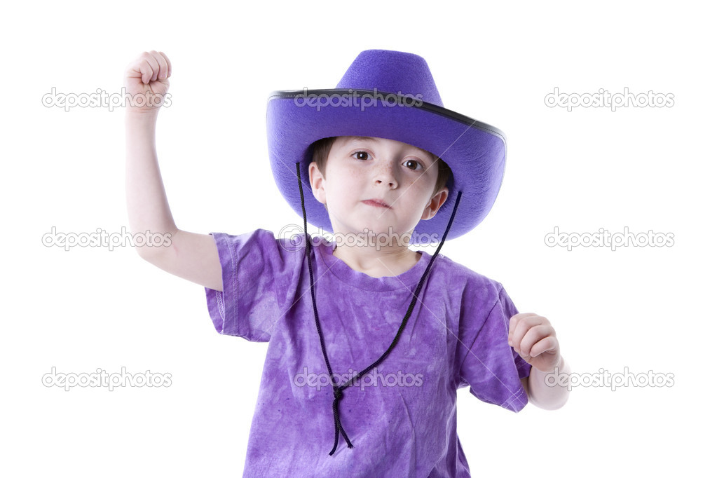 Caucasian little boy wearing a purple cowboy hat